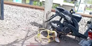 ft-sekeluarga-tertabrak-sepur-877655285